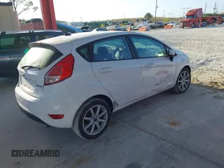 2019 Ford Fiesta SE with VIN 3FADP4EJ4KM136871, listed as a IAAI auction lot 42075343 with 89,185 mi miles and . Bid and sale history available at DreamBid. Image 4.