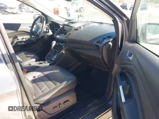 2015 Ford Escape Titanium with VIN 1FMCU9JX6FUB86304, listed as a IAAI auction lot 41595761 with 104,317 mi miles and . Bid and sale history available at DreamBid. Image 5.