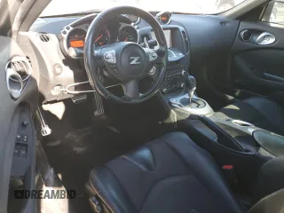 2014 Nissan 370Z Touring with VIN JN1AZ4EH1EM635411, listed as a Copart auction lot 82670344 with 77,501 mi miles and Salvage Title. Bid and sale history available at carsss.com. Image 8.