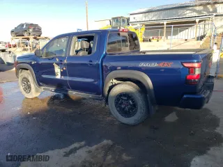 2022 Nissan Frontier PRO-4X with VIN 1N6ED1EK4NN618696, listed as a Copart auction lot 81848154 with 17,214 mi miles and Salvage Title. Bid and sale history available at carsss.com. Image 2.