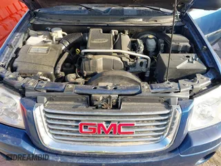 2006 GMC Envoy SLE with VIN 1GKDS13SX62315193, listed as a IAAI auction lot 41866029 with 231,164 mi miles. Bid and sale history available at carsss.com. Image 10.