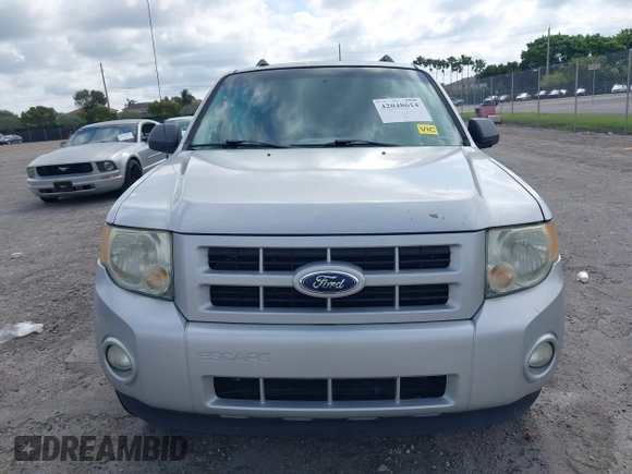 2011 Ford Escape Hybrid with VIN 1FMCU4K3XBKC60103, listed as a IAAI auction lot 42048614 with 125,354 mi miles and . Bid and sale history available at DreamBid. Image 12.