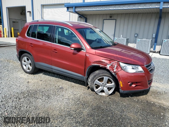 2010 Volkswagen Tiguan Wolfsburg Edition with VIN WVGAV7AX4AW003410, listed as a Copart auction lot 60645845 with 128,563 mi miles and Salvage title. Bid and sale history available at DreamBid. Image 4.