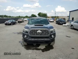 2020 Toyota Tacoma SR5 z VIN 3TYDZ5BN9LT000209, wystawiony jako Copart lot #56127875 z przebiegiem 92 350 mil mil oraz Szkoda całkowita • Salvage title. Historia ofert i sprzedaży dostępna na DreamBid. Obrazek 13.