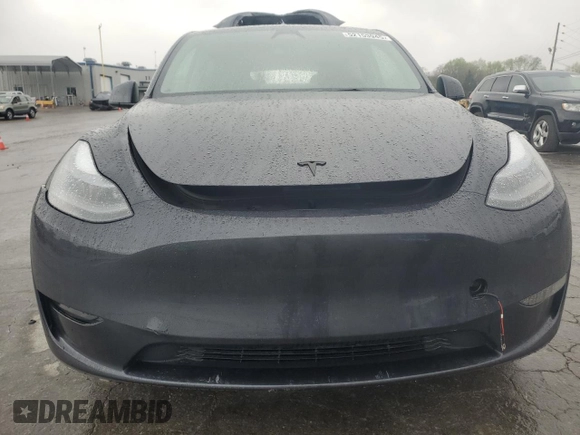 2024 Tesla Model Y with VIN 7SAYGDED1RA321691, listed as a Copart auction lot 52153945 with 7,544 mi miles and Salvage Title. Bid and sale history available at DreamBid. Image 5.