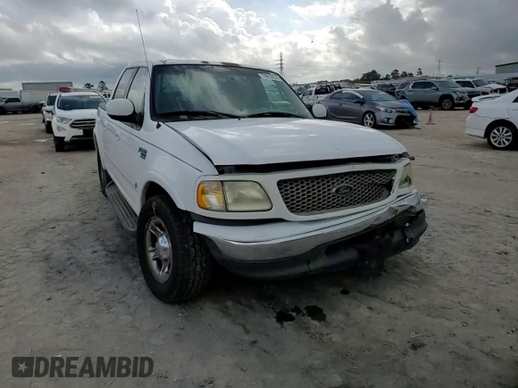 2001 Ford F-150 XLT with VIN 1FTRW07L01KC60815, listed as a Copart auction lot 87022424 with 205,304 mi miles and Salvage title. Bid and sale history available at DreamBid. Image 10.
