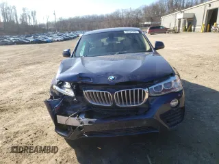 2015 BMW X4 xDrive28i with VIN 5UXXW3C59F0M88054, listed as a Copart auction lot 40534343 with 69,369 mi miles. Bid and sale history available at carsss.com. Image 5.