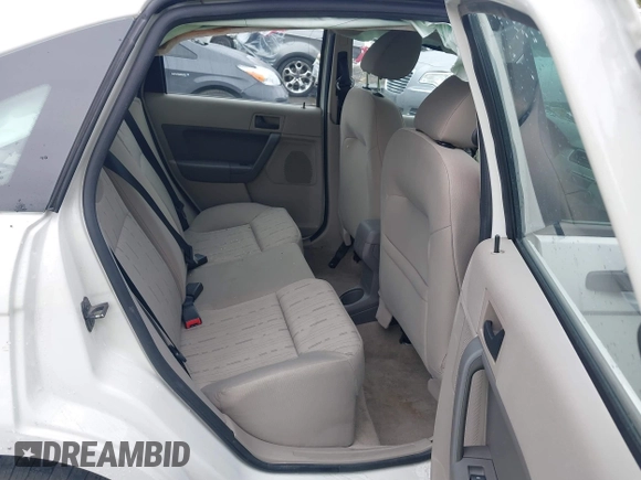 2009 Ford Focus SE z VIN 1FAHP35N19W114402, wystawiony jako IAAI lot #41510501 z przebiegiem Nie podano mil oraz . Historia ofert i sprzedaży dostępna na DreamBid. Obrazek 8.