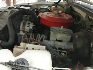 1993 Chevrolet Suburban z VIN 1GNFK16K1PJ330504, wystawiony jako IAAI lot #42194701 z przebiegiem 215 656 mil mil oraz . Historia ofert i sprzedaży dostępna na DreamBid. Obrazek 19.