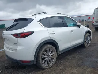 2019 Mazda CX-5 Grand Touring with VIN JM3KFBDM9K0697467, listed as a IAAI auction lot 41940364 with 62,015 mi miles. Bid and sale history available at carsss.com. Image 4.