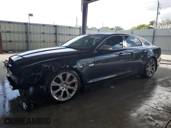 2014 Jaguar XJ Portfolio z VIN SAJWA2GZ4E8V60864, wystawiony jako Copart lot #76478674 z przebiegiem 50 578 mil mil oraz Szkoda całkowita • Salvage title. Historia ofert i sprzedaży dostępna na DreamBid. Obrazek 1.