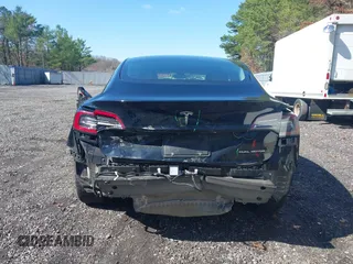 2023 Tesla Model 3 Long Range with VIN 5YJ3E1EB1PF392027, listed as a IAAI auction lot 41983638 with 31,415 mi miles and . Bid and sale history available at DreamBid. Image 6.