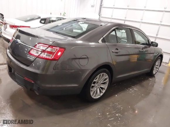 2015 Ford Taurus Limited with VIN 1FAHP2F87FG136199, listed as a IAAI auction lot 41920715 with 173,445 mi miles. Bid and sale history available at carsss.com. Image 4.