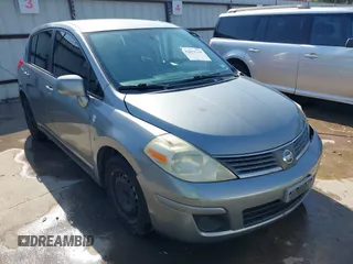 2009 Nissan Versa 1.8 SL with VIN 3N1BC13E19L372298, listed as a IAAI auction lot 42011338 with 131,882 mi miles. Bid and sale history available at carsss.com. Image 1.