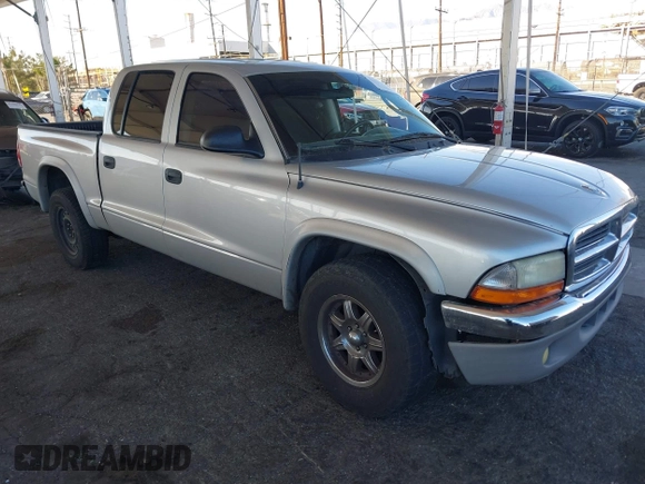 2003 Dodge Dakota SLT with VIN 1D7HL48N13S294573, listed as a IAAI auction lot 41291127 with 227,355 mi miles. Bid and sale history available at carsss.com. Image 1.