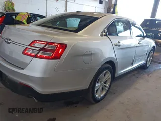 2015 Ford Taurus SE with VIN 1FAHP2D82FG183546, listed as a IAAI auction lot 41915780 with 72,773 mi miles and . Bid and sale history available at carsss.com. Image 4.