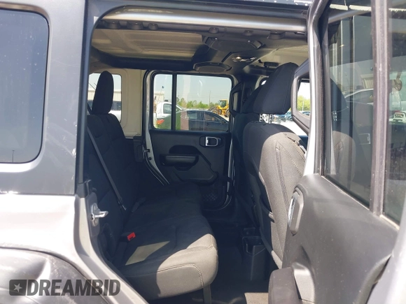 2021 Jeep Wrangler Unlimited Willys with VIN 1C4HJXDN1MW616467, listed as a IAAI auction lot 41791928 with 88,618 mi miles and . Bid and sale history available at DreamBid. Image 8.