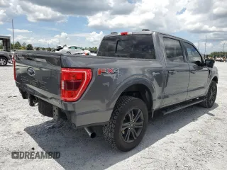 2021 Ford F-150 XL with VIN 1FTFW1E87MFC00633, listed as a Copart auction lot 65318235 with 91,264 mi miles and Salvage title. Bid and sale history available at DreamBid. Image 3.