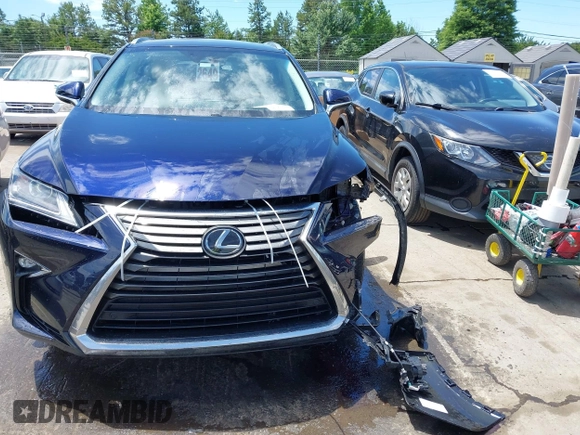 2019 Lexus RX 350 with VIN 2T2BZMCAXKC185818, listed as a IAAI auction lot 42308783 with 45,708 mi miles and . Bid and sale history available at DreamBid. Image 13.