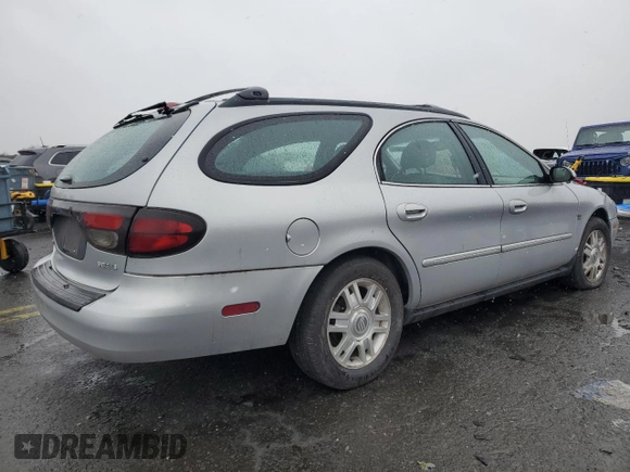 2004 Mercury Sable LS Premium with VIN 1MEHM59S54A605655, listed as a Copart auction lot 82005284 with 101,723 mi miles and Salvage Title. Bid and sale history available at DreamBid. Image 3.