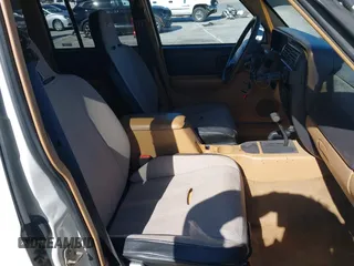 1997 Jeep Cherokee SE with VIN 1J4FJ28S7VL553270, listed as a IAAI auction lot 41825524 with 157,015 mi miles. Bid and sale history available at carsss.com. Image 5.