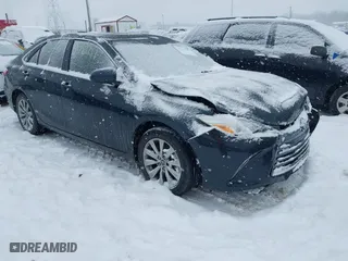 2015 Toyota Camry Hybrid LE with VIN 4T1BD1FK2FU167727, listed as a IAAI auction lot 41282184 with 130,140 mi miles. Bid and sale history available at carsss.com. Image 1.