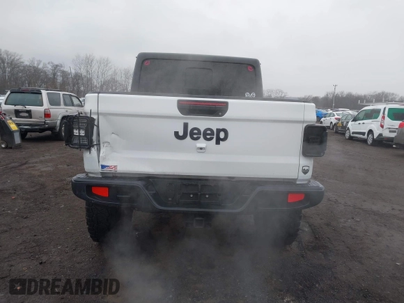 2020 Jeep Gladiator Sport S z VIN 1C6HJTAG0LL129461, wystawiony jako IAAI lot #41464713 z przebiegiem 66 625 mil mil oraz . Historia ofert i sprzedaży dostępna na DreamBid. Obrazek 16.