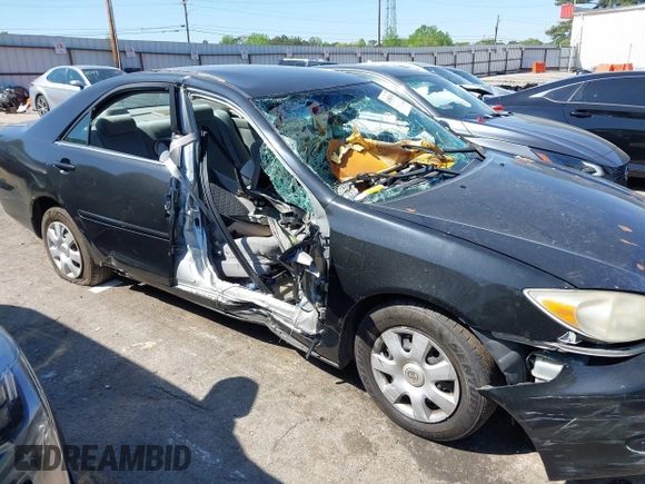 2004 Toyota Camry LE with VIN 4T1BE32K54U270040, listed as a IAAI auction lot 41984769 with Not provided miles and . Bid and sale history available at DreamBid. Image 13.