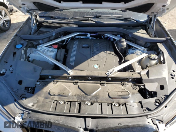 2022 BMW X5 sDrive40i with VIN 5UXCR4C01N9J97204, listed as a Copart auction lot 88157405 with 34,788 mi miles and Salvage Title. Bid and sale history available at carsss.com. Image 11.
