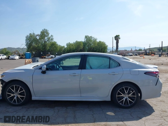 2023 Toyota Camry SE with VIN 4T1T11AK8PU138805, listed as a IAAI auction lot 41977827 with 19,661 mi miles and . Bid and sale history available at DreamBid. Image 15.