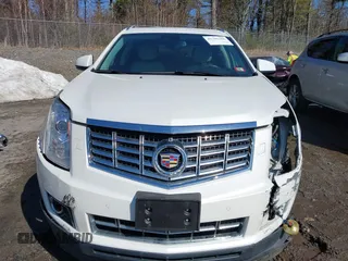 2014 Cadillac SRX Performance Collection with VIN 3GYFNFE30ES586713, listed as a IAAI auction lot 41791356 with 74,927 mi miles and . Bid and sale history available at DreamBid. Image 13.