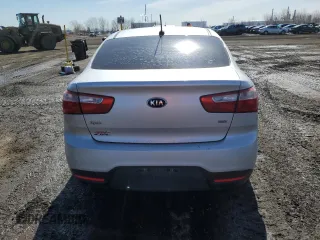 2015 Kia Rio LX with VIN KNADM4A39F6514695, listed as a Copart auction lot 52280395 with 136,824 mi miles and Salvage Title. Bid and sale history available at carsss.com. Image 6.