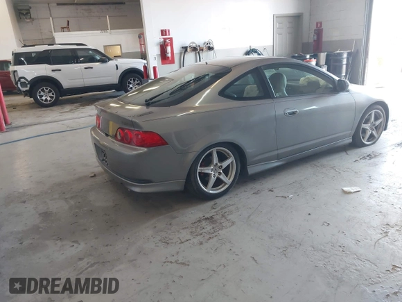 2005 Acura RSX Type S with VIN JH4DC53025S004434, listed as a IAAI auction lot 42002540 with 162,630 mi miles and . Bid and sale history available at DreamBid. Image 4.