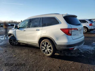 2020 Honda Pilot Touring 8-Passenger with VIN 5FNYF6H9XLB029731, listed as a Copart auction lot 45935965 with 80,691 mi miles and Salvage Title. Bid and sale history available at DreamBid. Image 2.