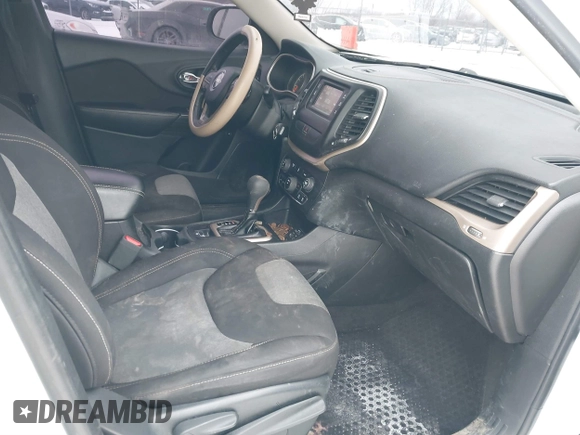 2016 Jeep Cherokee Altitude with VIN 1C4PJLAB4GW376723, listed as a IAAI auction lot 41593248 with 96,940 mi miles and . Bid and sale history available at DreamBid. Image 5.