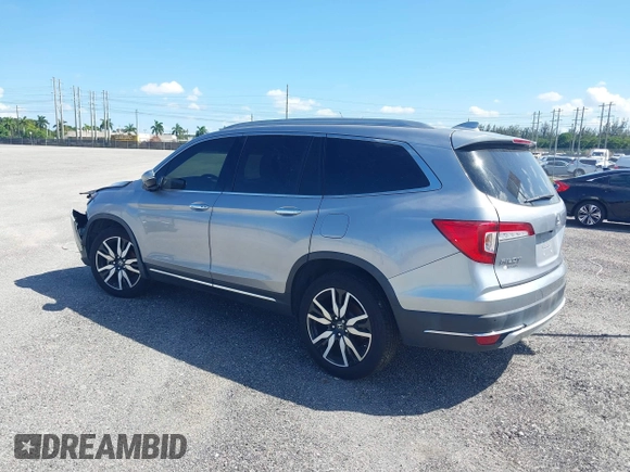 2021 Honda Pilot Touring 8-Passenger with VIN 5FNYF5H99MB041638, listed as a IAAI auction lot 42112915 with 33,230 mi miles and . Bid and sale history available at DreamBid. Image 3.
