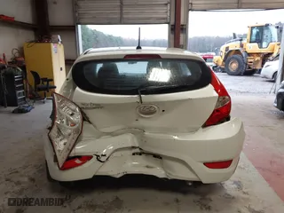2013 Hyundai Accent GL with VIN KMHCT5AE6DU122559, listed as a IAAI auction lot 41800714 with 129,582 mi miles. Bid and sale history available at carsss.com. Image 6.
