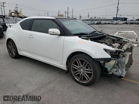 2013 Scion tC z VIN JTKJF5C77D3056779, wystawiony jako Copart lot #57459935 z przebiegiem 157 420 mil mil oraz Szkoda całkowita • Salvage title. Historia ofert i sprzedaży dostępna na DreamBid. Obrazek 4.