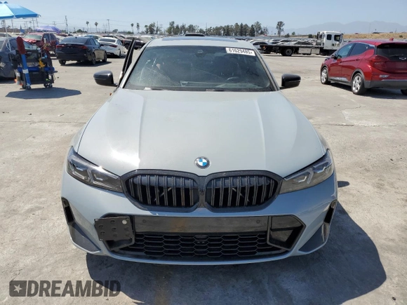2023 BMW 3 Series 330i with VIN 3MW69FF00P8D52700, listed as a Copart auction lot 61629485 with 12,007 mi miles and Salvage title. Bid and sale history available at DreamBid. Image 5.