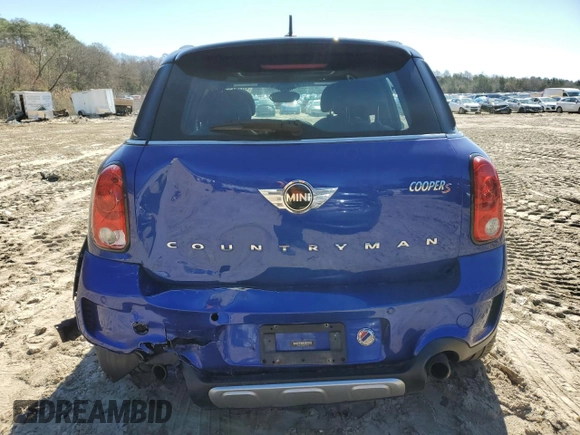 2016 MINI Countryman S with VIN WMWZC5C56GWP49473, listed as a Copart auction lot 50752355 with 118,060 mi miles and Salvage Title. Bid and sale history available at DreamBid. Image 6.