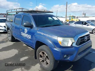 2015 Toyota Tacoma PreRunner with VIN 3TMKU4HN4FM046974, listed as a IAAI auction lot 41389758 with 189,449 mi miles and . Bid and sale history available at DreamBid. Image 1.