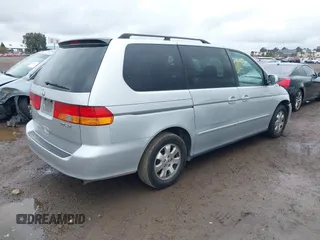 2003 Honda Odyssey EX-L z VIN 5FNRL18033B096575, wystawiony jako IAAI lot #41576926 z przebiegiem 210 932 mil mil oraz . Historia ofert i sprzedaży dostępna na DreamBid. Obrazek 4.
