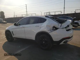 2016 BMW X6 sDrive35i with VIN 5UXKU0C52G0F92890, listed as a Copart auction lot 87875115 with 101,927 mi miles and Salvage Title. Bid and sale history available at carsss.com. Image 2.