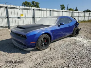 2018 Dodge Challenger z VIN 2C3CDZH91JH101011, wystawiony jako Copart lot #71538124 z przebiegiem Nie podano mil oraz Czysty tytuł • Clean title. Historia ofert i sprzedaży dostępna na DreamBid. Obrazek 1.