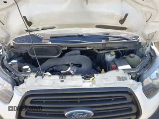 2019 Ford Transit with VIN 1FTYR2ZM5KKB12066, listed as a IAAI auction lot 41958244 with 165,495 mi miles. Bid and sale history available at carsss.com. Image 10.