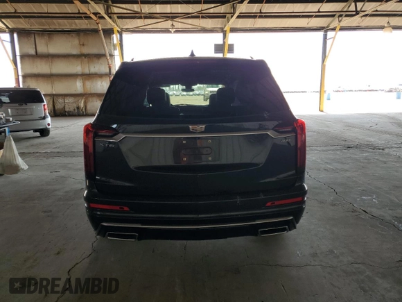2020 Cadillac XT6 FWD Premium Luxury with VIN 1GYKPCRS8LZ149860, listed as a Copart auction lot 61108985 with 58,459 mi miles and Salvage title. Bid and sale history available at DreamBid. Image 6.