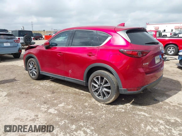 2018 Mazda CX-5 Grand Touring with VIN JM3KFADM7J1357401, listed as a IAAI auction lot 42106012 with 119,420 mi miles and . Bid and sale history available at DreamBid. Image 3.