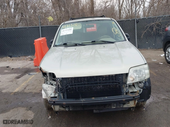 2005 Mercury Mariner Luxury with VIN 4M2YU57175DJ05986, listed as a IAAI auction lot 41713180 with 243,682 mi miles. Bid and sale history available at carsss.com. Image 6.