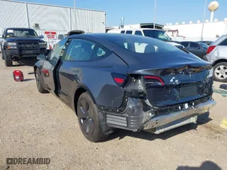 2023 Tesla Model 3 with VIN 5YJ3E1EA1PF576780, listed as a IAAI auction lot 41657295 with 15,138 mi miles. Bid and sale history available at carsss.com. Image 3.