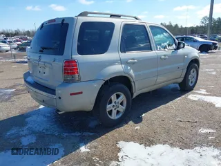 2007 Mercury Mariner with VIN 4M2CU39H07KJ20952, listed as a IAAI auction lot 41502938 with 148,622 mi miles and . Bid and sale history available at DreamBid. Image 4.